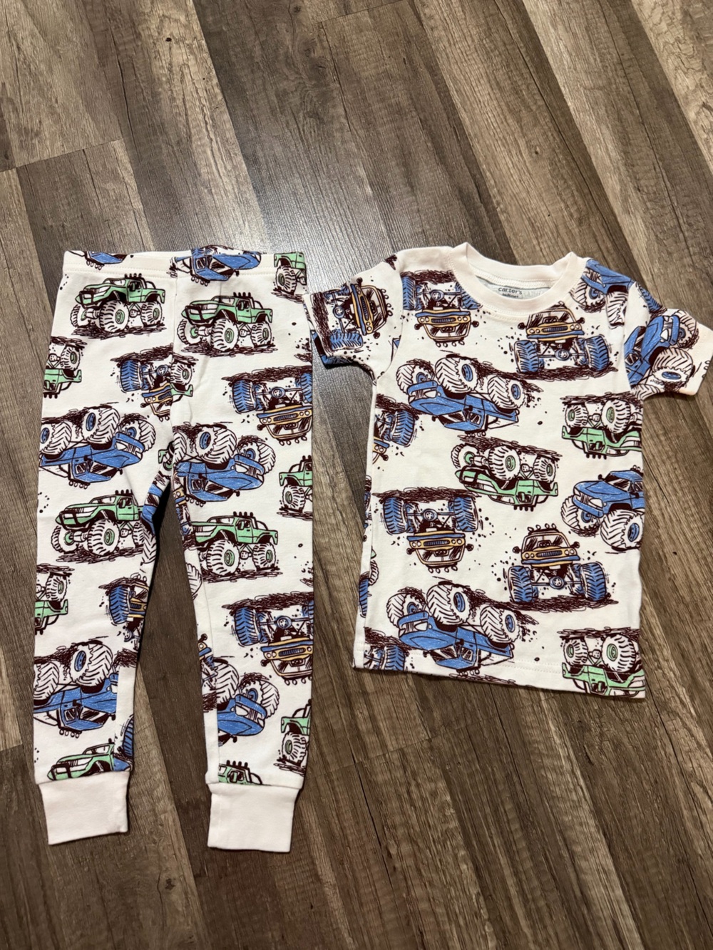 Carter's White Pajama Set with Blue & Green Monster Trucks